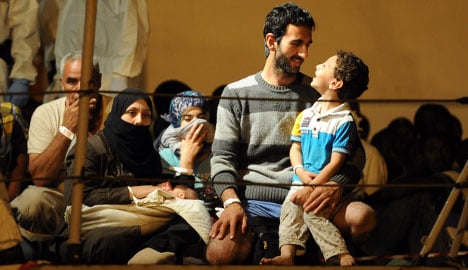Migrants Pozzallo Sicily 2 July 2014 by Giovanni Isolino AFP
